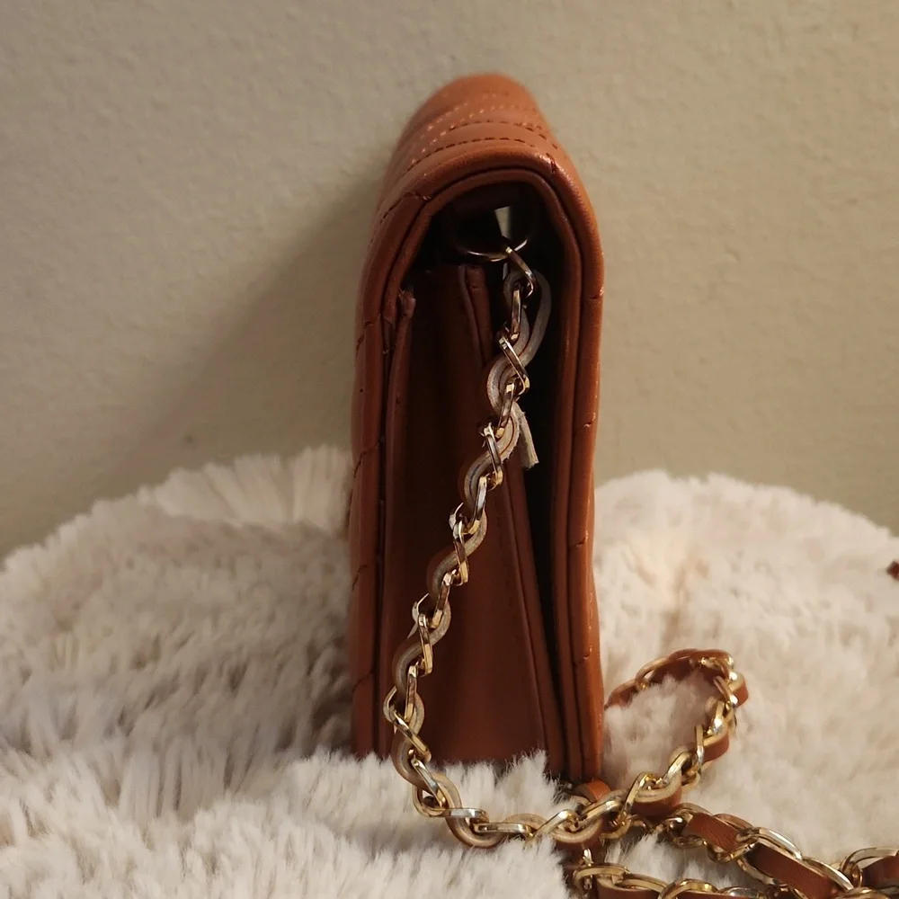 Bebe quilted bag with Gold rope chain cross body bag. Gently Used - Picture 8 of 16